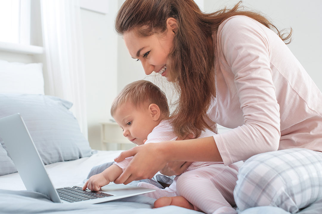 Mother and child using a computer